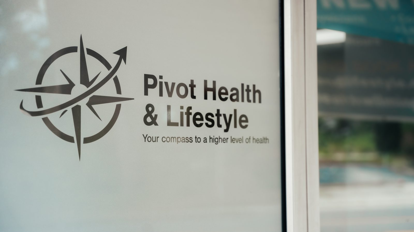 Pivot Health & Lifestyle logo and name on the entrance glass